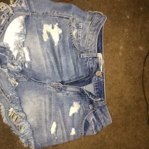 Refuge ripped short. Size 2